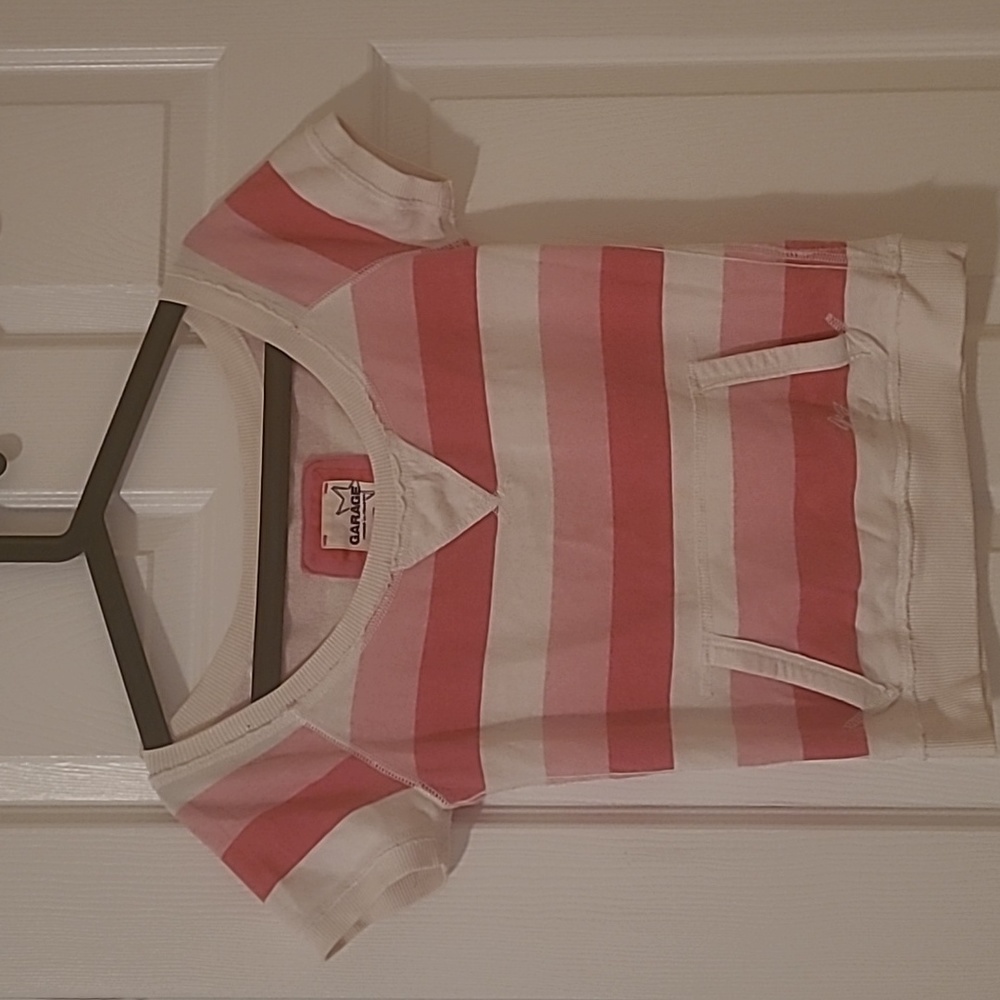 XS stripped tee shirt in shades of pink and white.